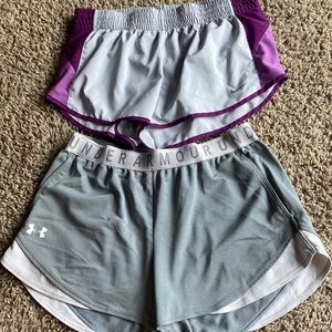 Athletic short bundle. Grey and purple nike. Grey and white under armor.